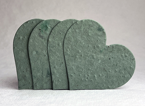 #14s Green Lotka seed paper hearts