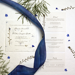 seed paper wedding invitations with ribbon