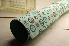 aqua with red and cream and teal circles handmade paper roll