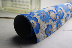 blue gold flowers on tan handmade paper roll